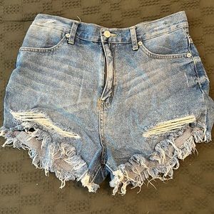 Distressed denim shorts